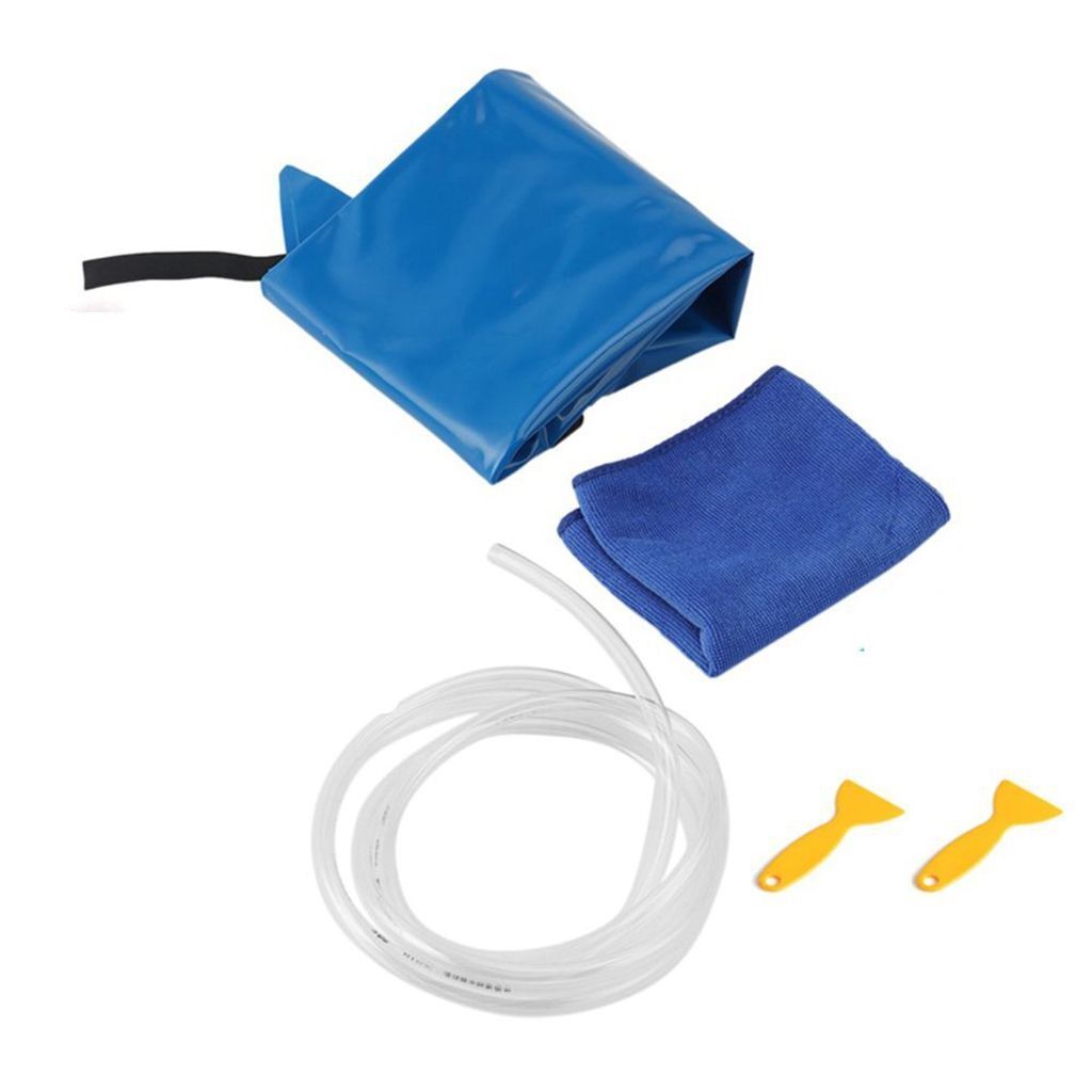 Tradie using waterproof bag for coil cleaning runoff