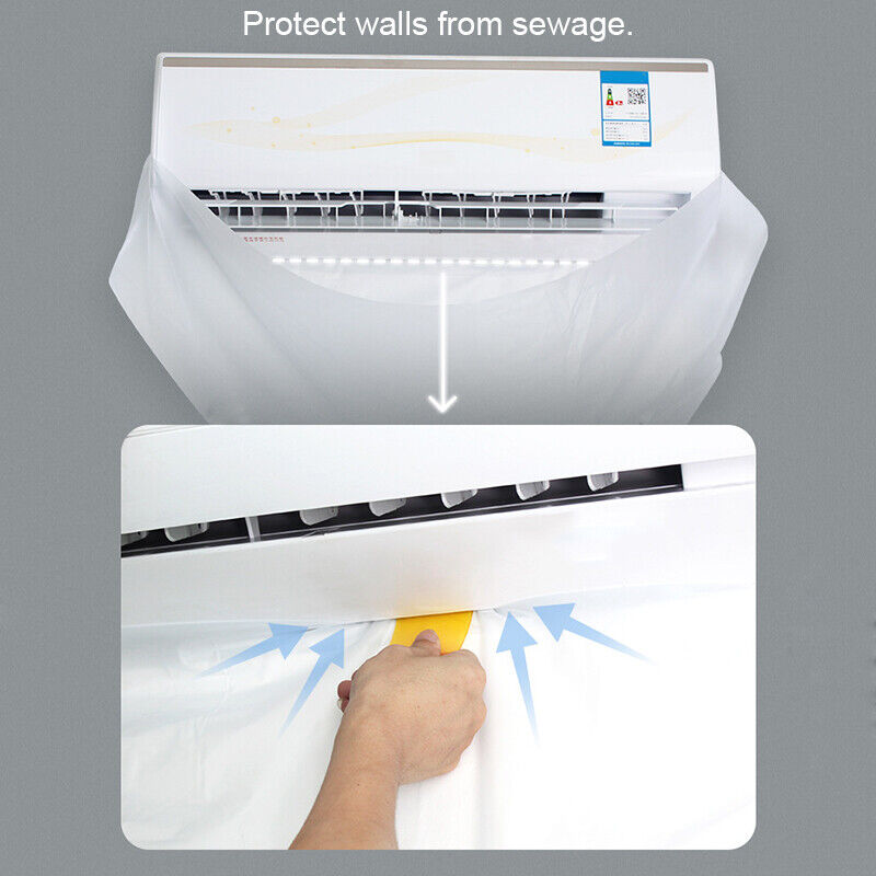 HVAC technician using wall-mountable split AC cleaning bag inside a home
